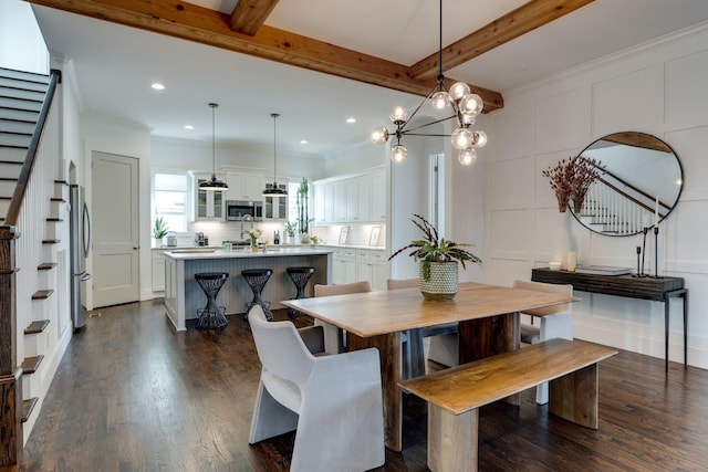 dining area featuring beamed ceiling, dark wood finished floors, stairs, and ornamental molding