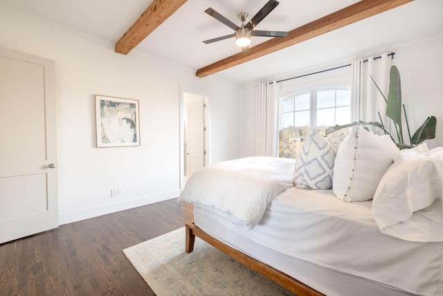 bedroom featuring beam ceiling, ceiling fan, baseboards, and wood finished floors