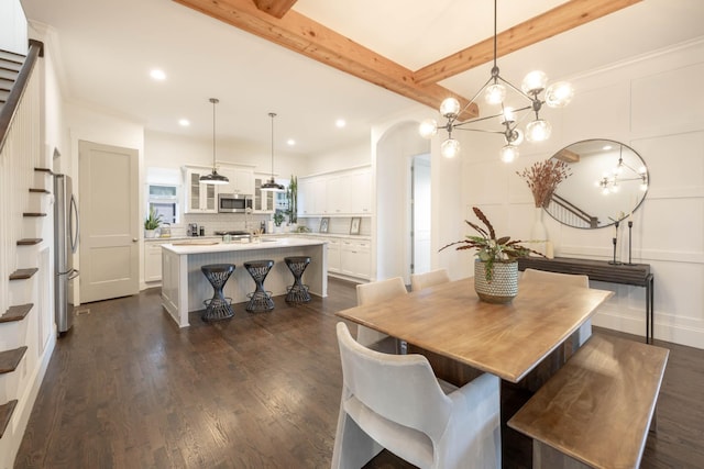 dining room with dark wood finished floors, stairway, beamed ceiling, and recessed lighting