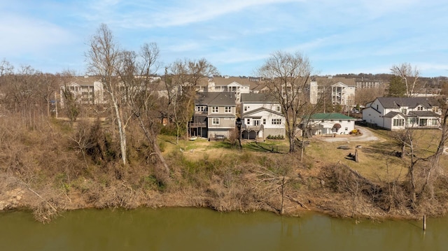 aerial view featuring a residential view and a water view