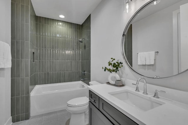 bathroom featuring washtub / shower combination, tile patterned flooring, vanity, and toilet