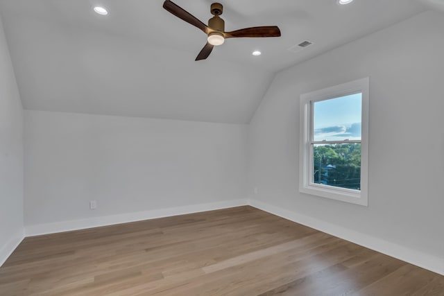 bonus room featuring recessed lighting, visible vents, baseboards, vaulted ceiling, and light wood-style floors