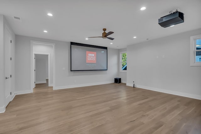 empty room with baseboards, light wood-style floors, visible vents, and recessed lighting