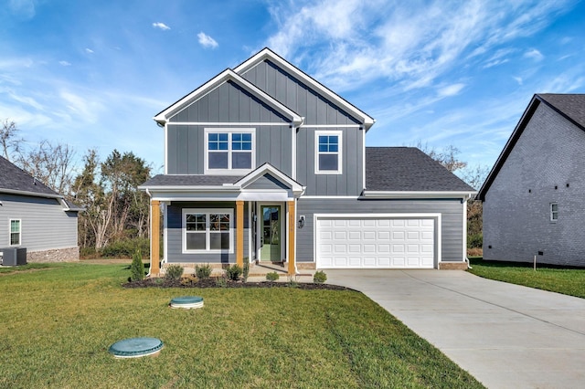 view of front of house with a shingled roof, concrete driveway, cooling unit, board and batten siding, and a front yard