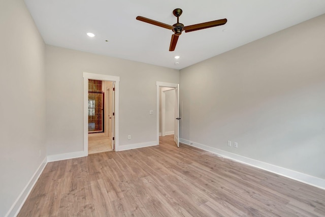 unfurnished room featuring light wood finished floors, ceiling fan, baseboards, and recessed lighting