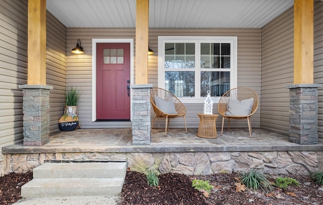 property entrance featuring covered porch