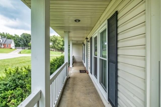 view of patio featuring a porch