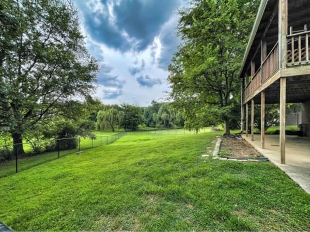 view of yard with a patio area and fence