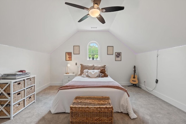 bedroom featuring baseboards, visible vents, a ceiling fan, carpet, and vaulted ceiling