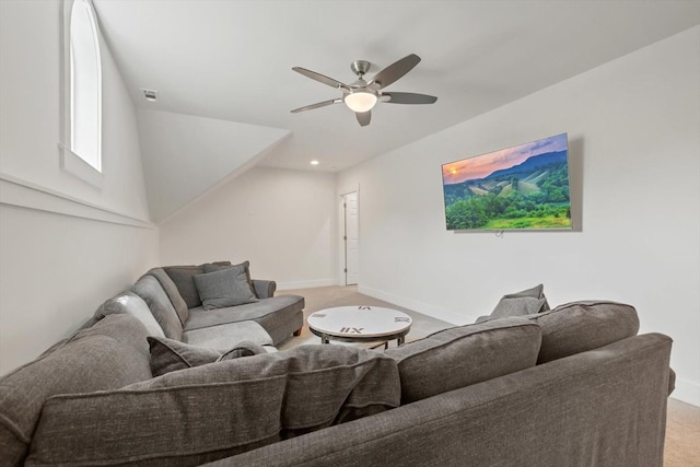 living room with light carpet, ceiling fan, visible vents, and baseboards