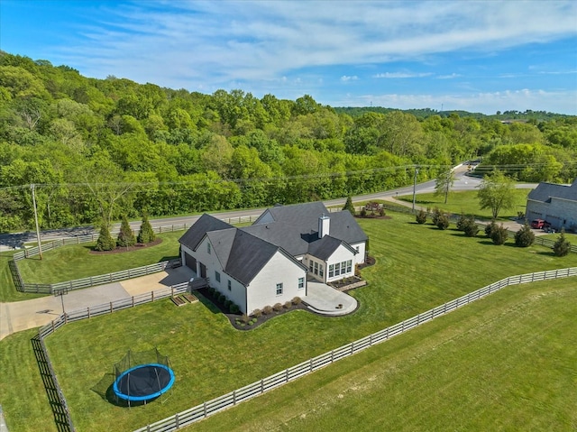 drone / aerial view with a forest view