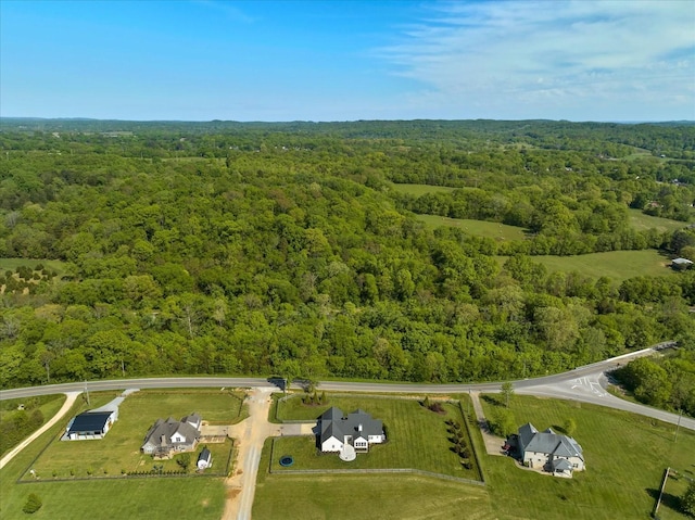 aerial view with a wooded view