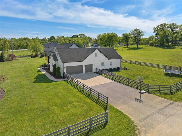 birds eye view of property with a rural view