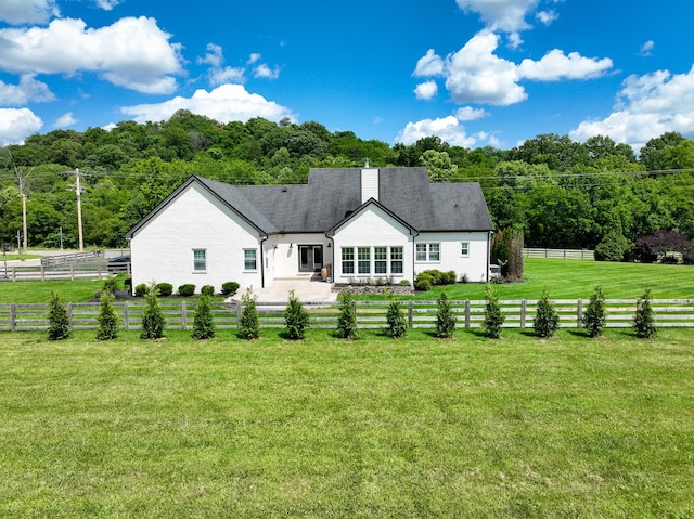 427 Carters Creek Pike, Columbia, TN 38401 - back of house featuring a chimney and a patio