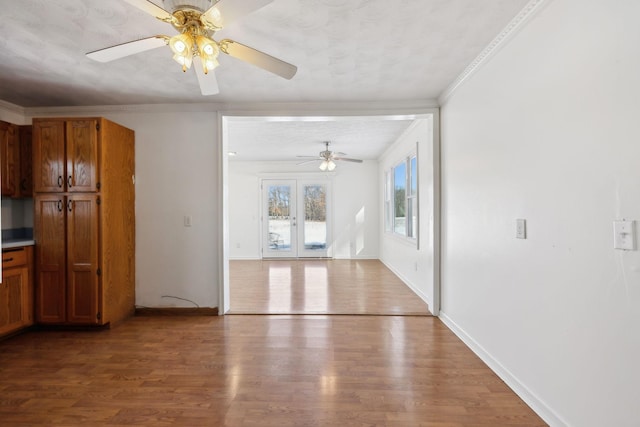 120 Wilkerson Ln, Portland, TN 37148 - interior space with ceiling fan, wood finished floors, baseboards, french doors, and crown molding