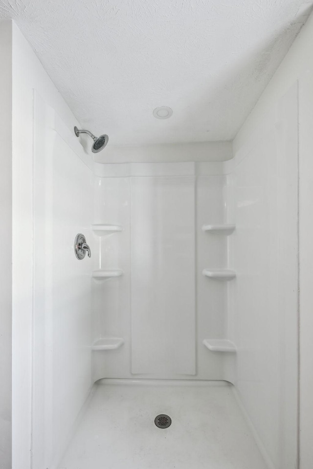 120 Wilkerson Ln, Portland, TN 37148 - bathroom featuring a textured ceiling and a shower