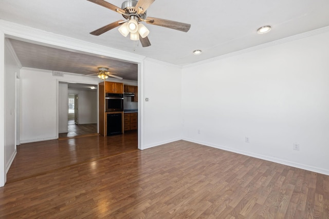 120 Wilkerson Ln, Portland, TN 37148 - spare room featuring crown molding, visible vents, baseboards, and wood finished floors