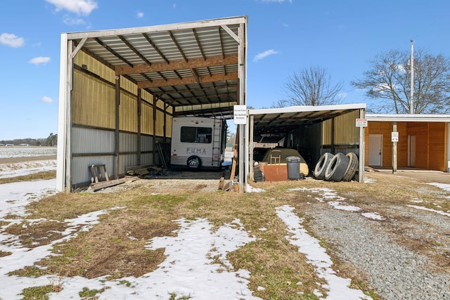 120 Wilkerson Ln, Portland, TN 37148 - view of car parking with an outbuilding