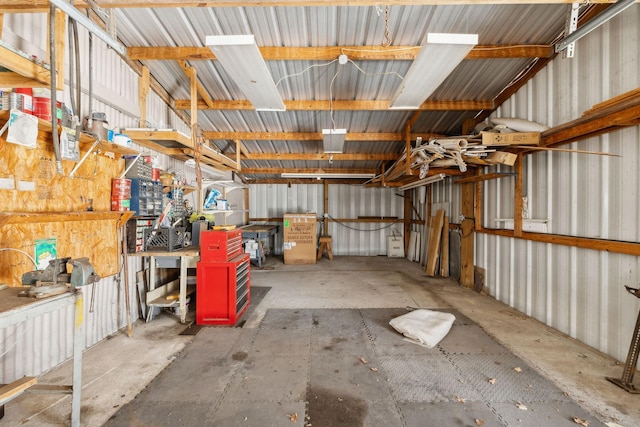 120 Wilkerson Ln, Portland, TN 37148 - garage with a workshop area and metal wall