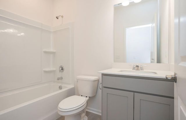 bathroom featuring  shower combination, vanity, toilet, and baseboards