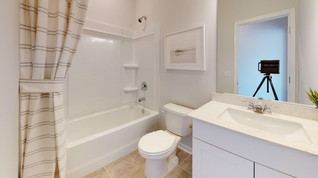 full bath featuring shower / bath combo, vanity, toilet, and tile patterned floors