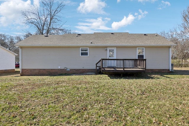 back of property featuring a shingled roof, crawl space, a lawn, and a wooden deck