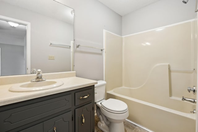 full bathroom with shower / bath combination, vanity, and toilet