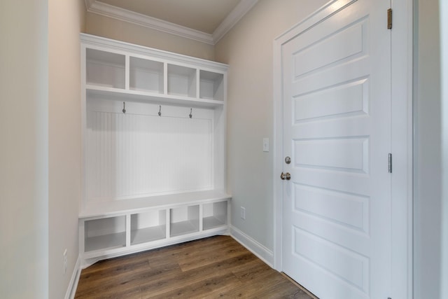 mudroom featuring dark wood-style floors, baseboards, and crown molding