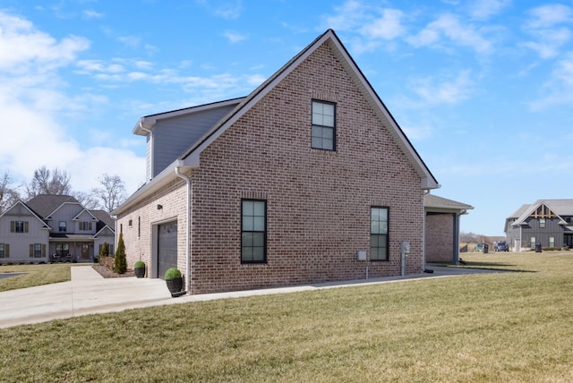 view of property exterior featuring a yard, concrete driveway, brick siding, and a garage