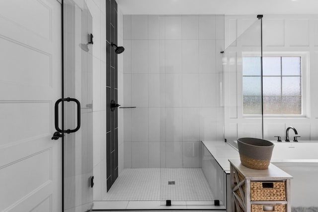 bathroom featuring a shower stall