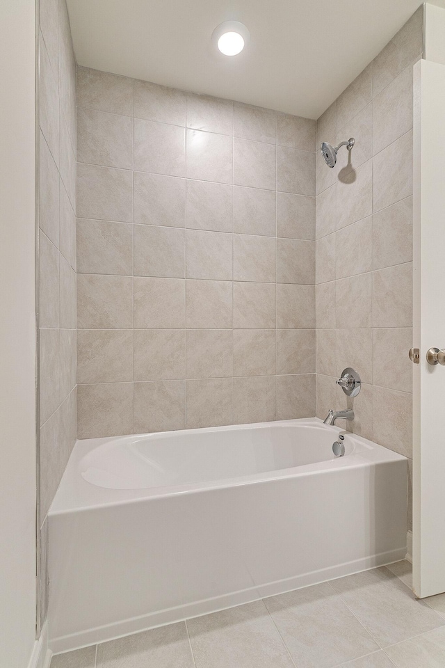 full bathroom with  shower combination and tile patterned flooring