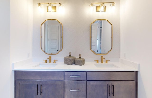 full bath with double vanity and a sink