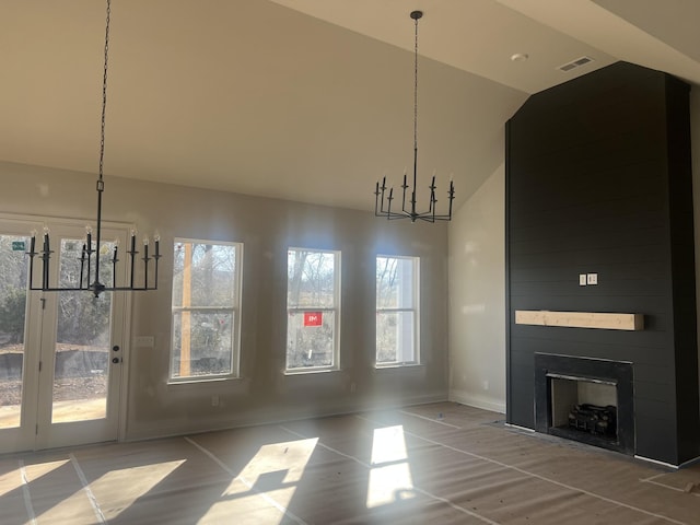 unfurnished dining area featuring high vaulted ceiling, a notable chandelier, a large fireplace, visible vents, and a healthy amount of sunlight