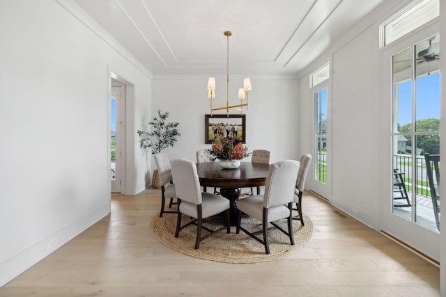6324 Percheron Ln, Arrington, TN 37014 - dining space featuring light wood-style flooring, crown molding, baseboards, and a notable chandelier