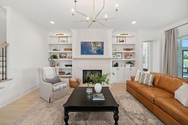 6324 Percheron Ln, Arrington, TN 37014 - living area featuring stairs, ornamental molding, a fireplace, and built in shelves