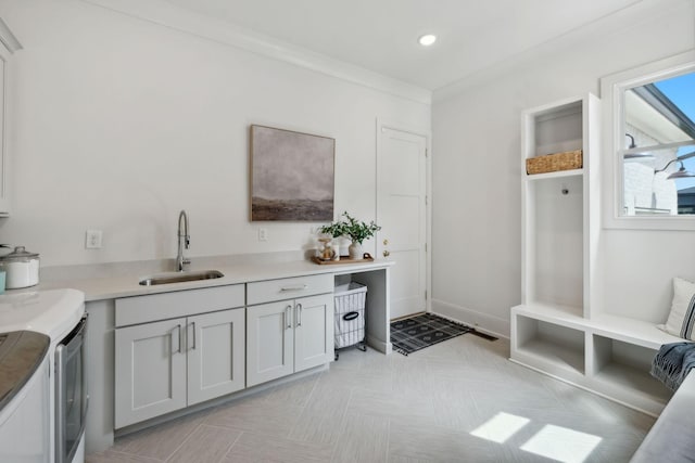 6324 Percheron Ln, Arrington, TN 37014 - interior space featuring cabinet space, baseboards, washer and clothes dryer, a sink, and recessed lighting