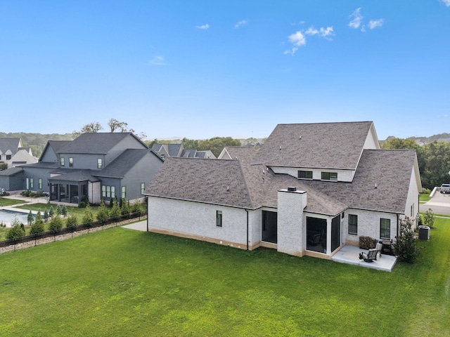 6324 Percheron Ln, Arrington, TN 37014 - back of property featuring central AC, a patio, a lawn, and a fenced backyard