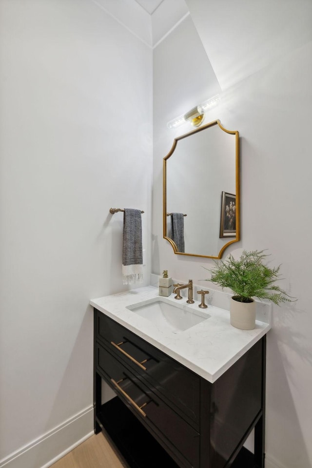 6324 Percheron Ln, Arrington, TN 37014 - bathroom with vanity, baseboards, and wood finished floors