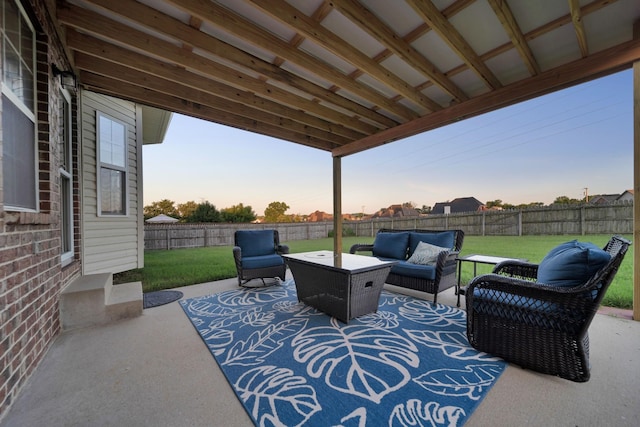 view of patio featuring outdoor lounge area and a fenced backyard