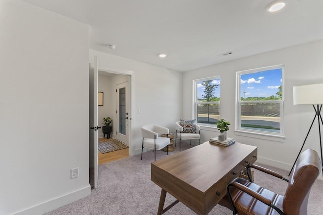 office area featuring carpet, visible vents, baseboards, and recessed lighting