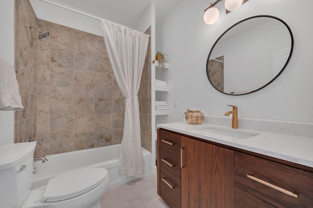 bathroom with toilet, shower / bath combo, and vanity