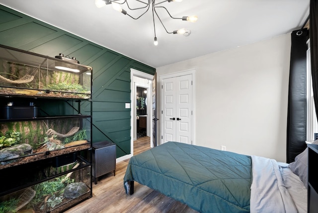 bedroom featuring wood finished floors