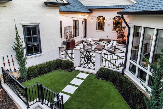 view of yard featuring a patio area and an outdoor hangout area