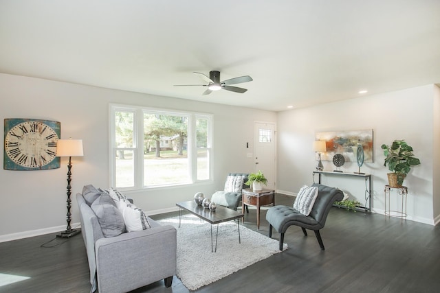 living area featuring dark wood-style flooring, recessed lighting, and baseboards