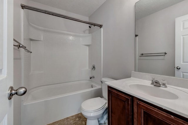 bathroom featuring a textured ceiling, shower / tub combination, tile patterned flooring, toilet, and vanity