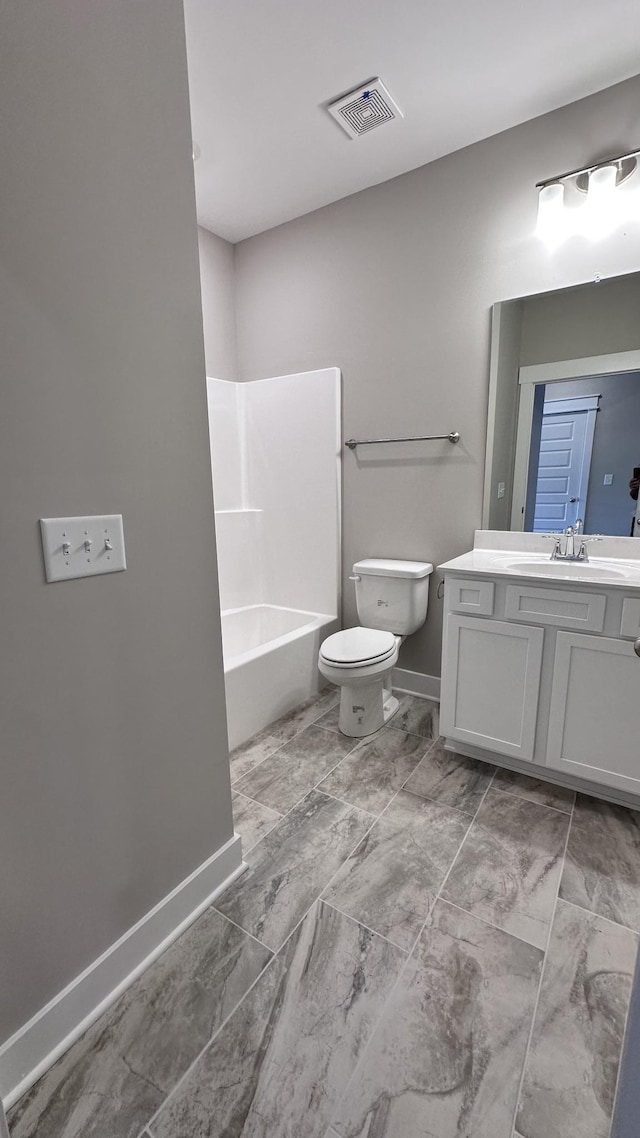 full bath featuring toilet, vanity, visible vents, baseboards, and shower / bathing tub combination