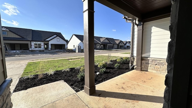 view of yard with a residential view