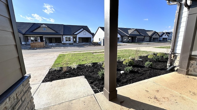 view of yard featuring a residential view