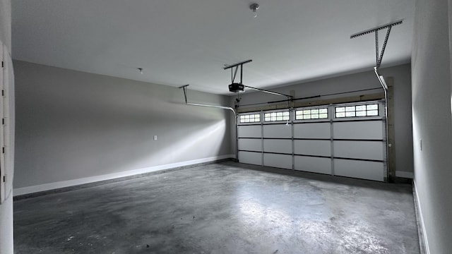 garage featuring baseboards