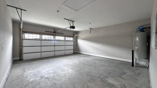 garage featuring a garage door opener, gas water heater, and baseboards